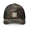 Never Waver Camo Trucker Hat — Embroidered Rustic Patch Cap