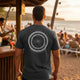 "The World Is A Better Place With You In It." This premium motivational tee reminds you of your unique value and impact. by Never Waver